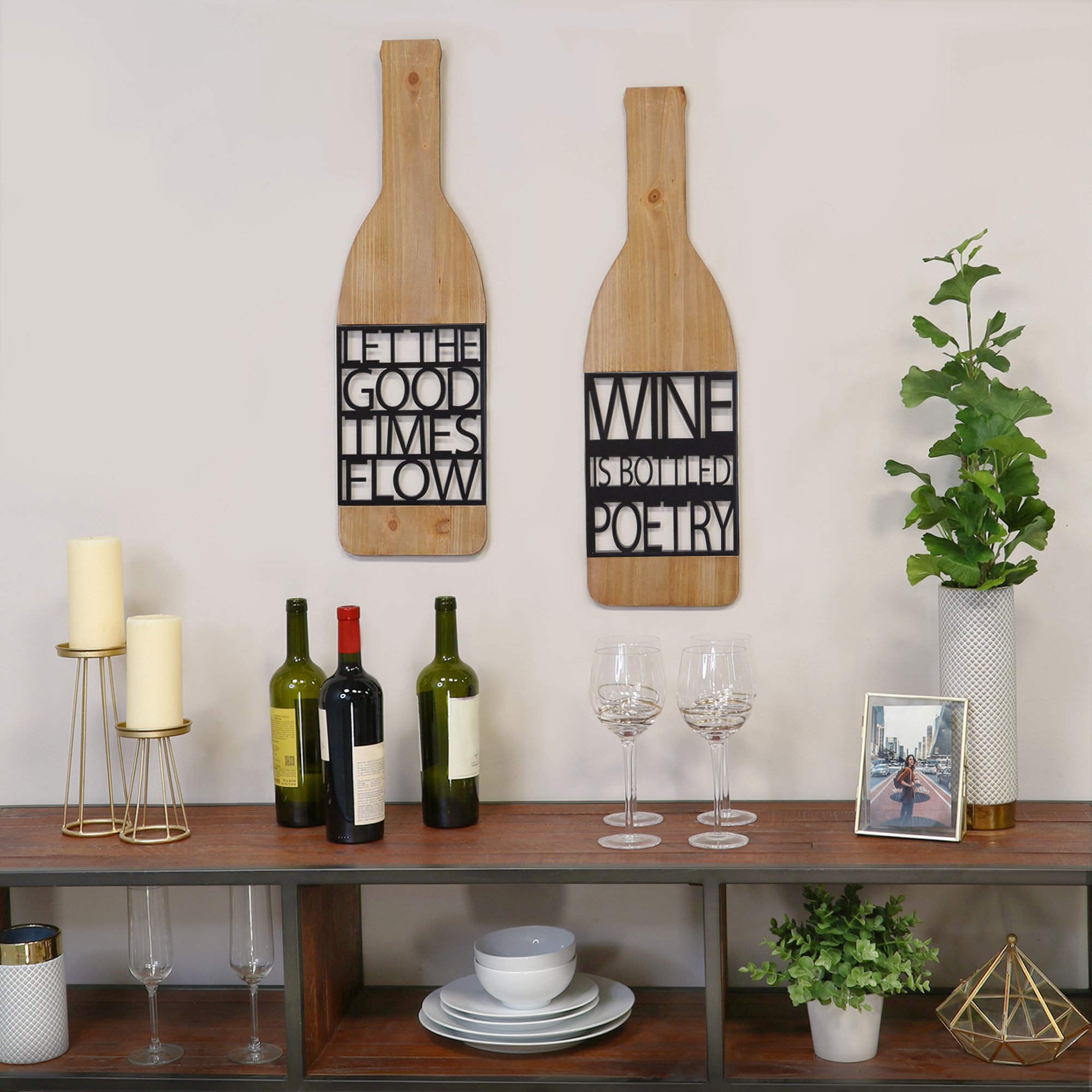 Elegant wall decor featuring the phrase 'Wine is Bottled Poetry' in black metal with natural wood accents, perfect for wine lovers.
