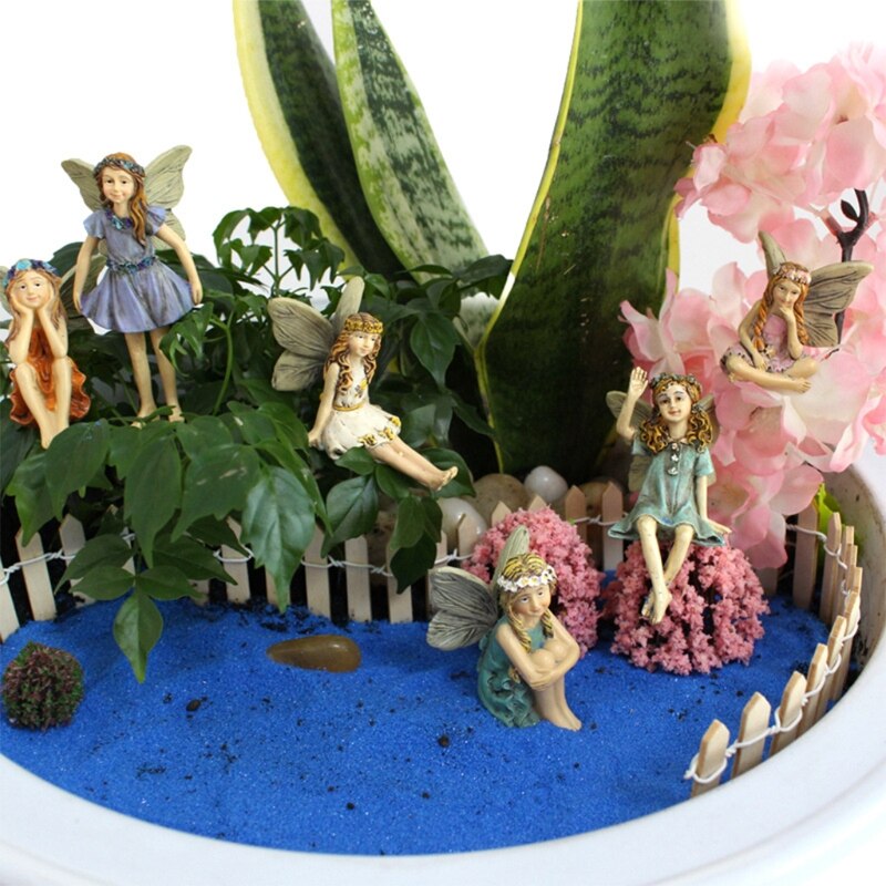 A colorful set of 6 miniature fairy figurines, made of resin, designed for fairy gardens, showcasing vibrant colors and intricate details.
