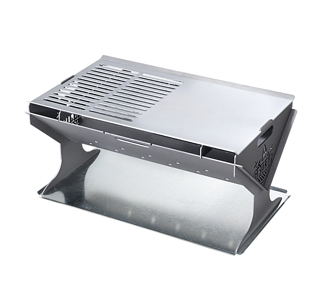 Grillz Fire Pit BBQ with stainless steel grill, portable and foldable design, set up for outdoor cooking.