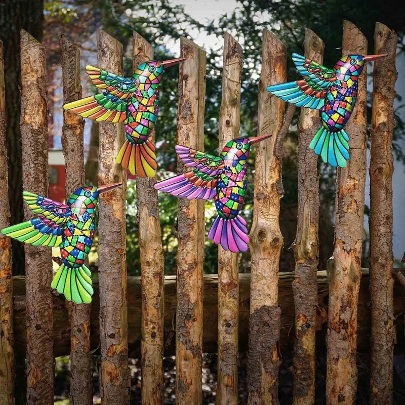 Colorful metal hummingbird wall art ornament, perfect for garden or indoor decor, showcasing vibrant colors and intricate design.