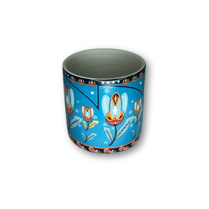 Light blue cup pot with a smiling floral pattern, perfect for small plants, featuring a drain hole at the bottom.
