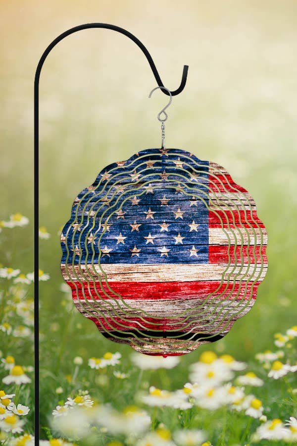 10-inch double-sided Patriotic USA American Flag Wind Spinner hanging outdoors, showcasing vibrant colors and design.