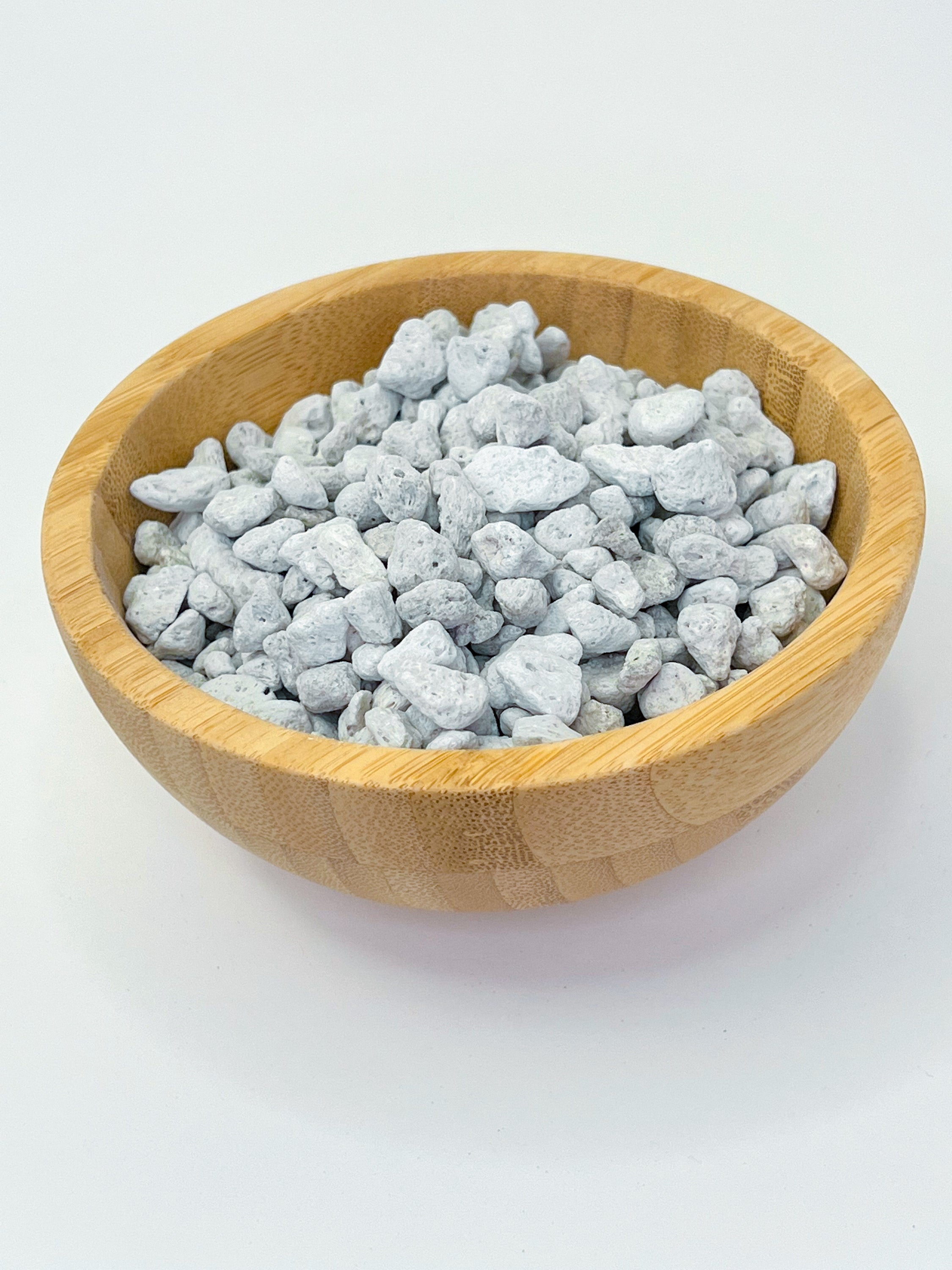 A bag of Sol Soils pumice, a lightweight volcanic rock soil amendment, ideal for enhancing drainage and moisture retention in potted plants.