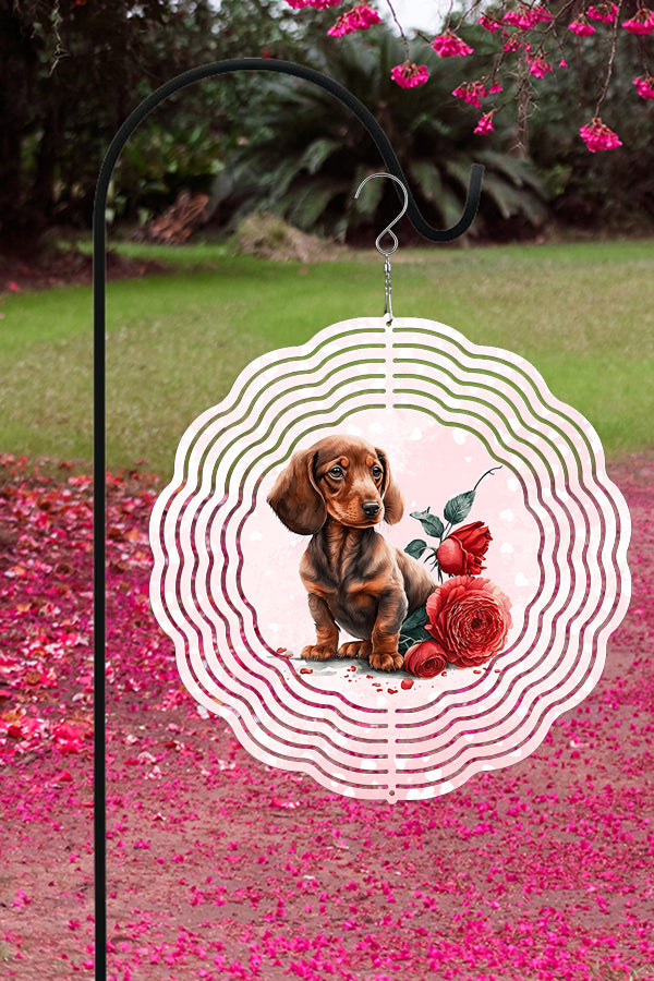 A colorful 10-inch aluminum wind spinner featuring a playful dachshund design, perfect for garden decor.