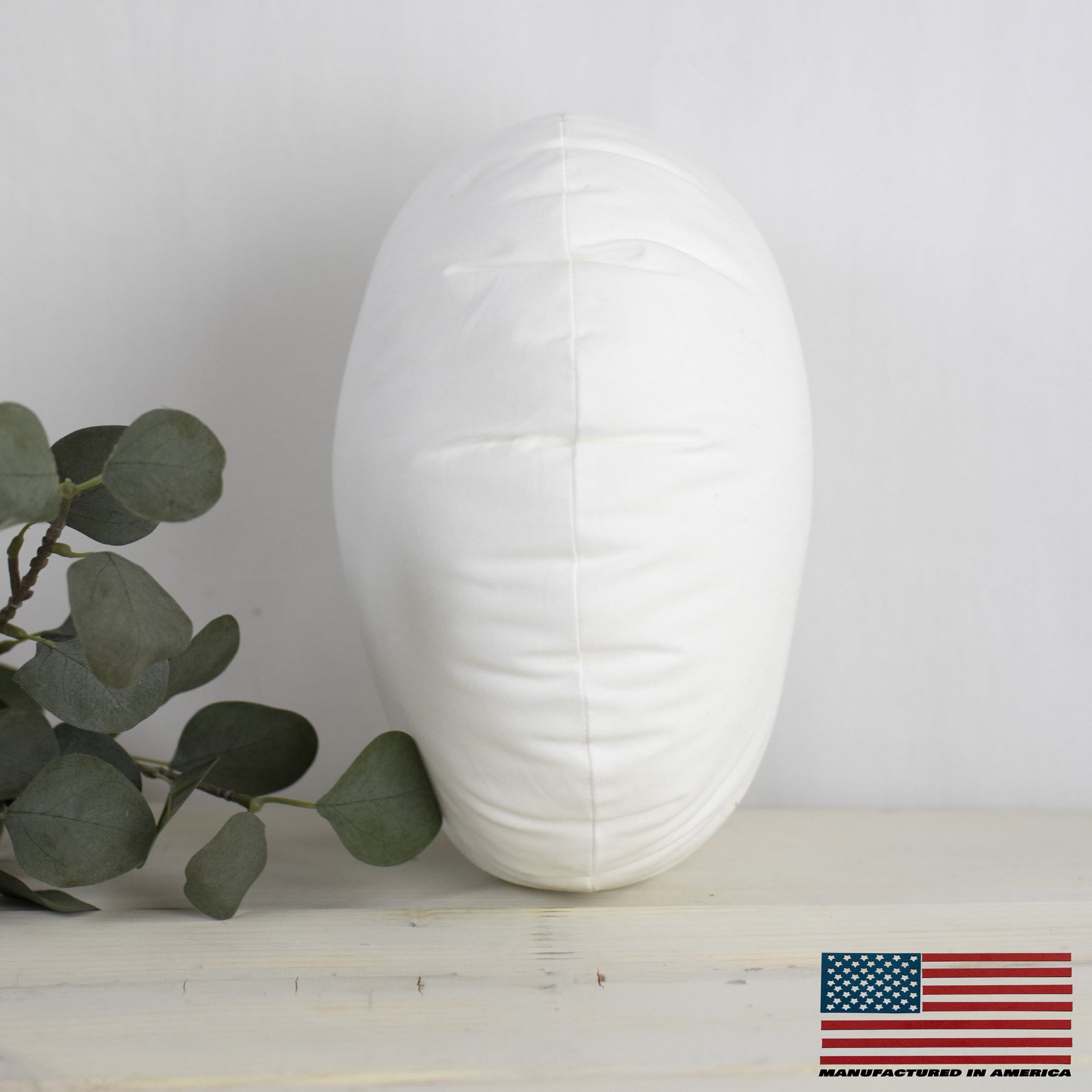11-inch round angel hair down alternative pillow insert with soft polyester fill, perfect for indoor and outdoor use.