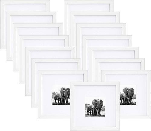 A set of 15 white 8x8 picture frames with beveled mats, showcasing 4x4 photos, perfect for wall or tabletop display.