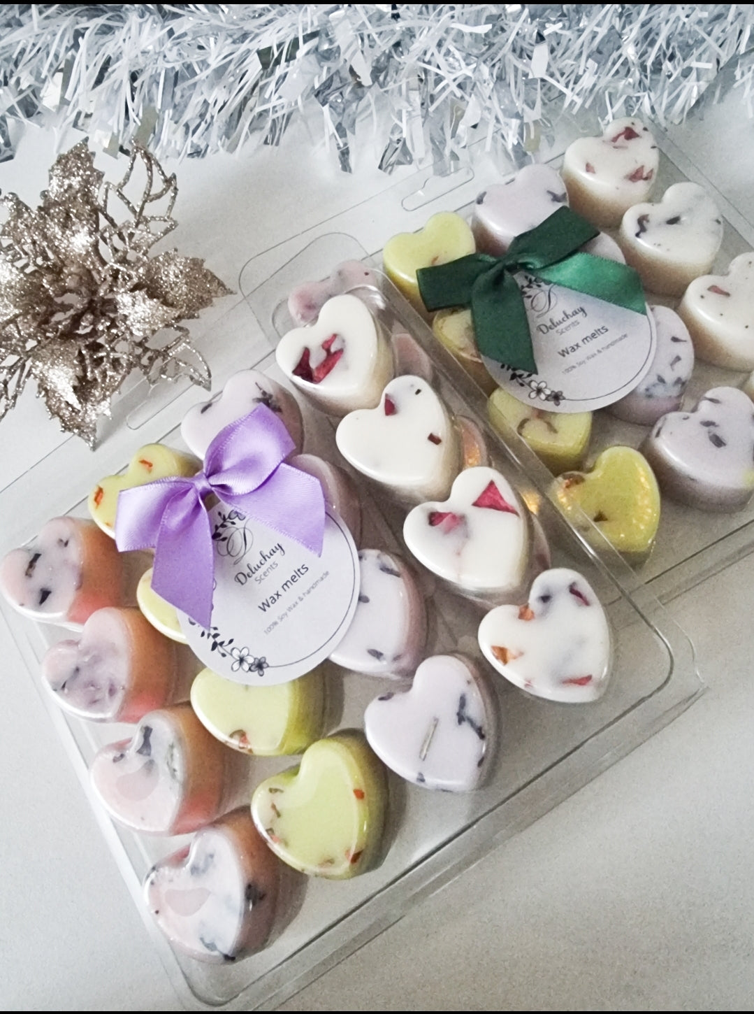 A collection of 16 heart-shaped wax melts in various colors, showcasing their handmade quality and eco-friendly nature.