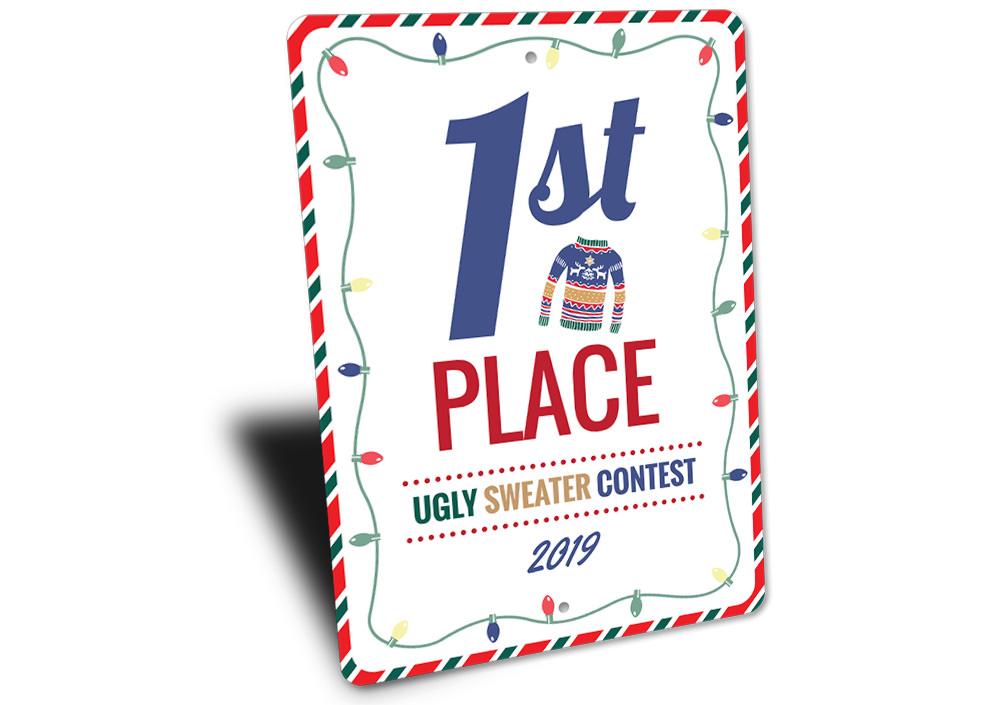 A festive 1st Place Ugly Sweater Contest Sign made of aluminum, featuring colorful holiday designs perfect for Christmas decorations.