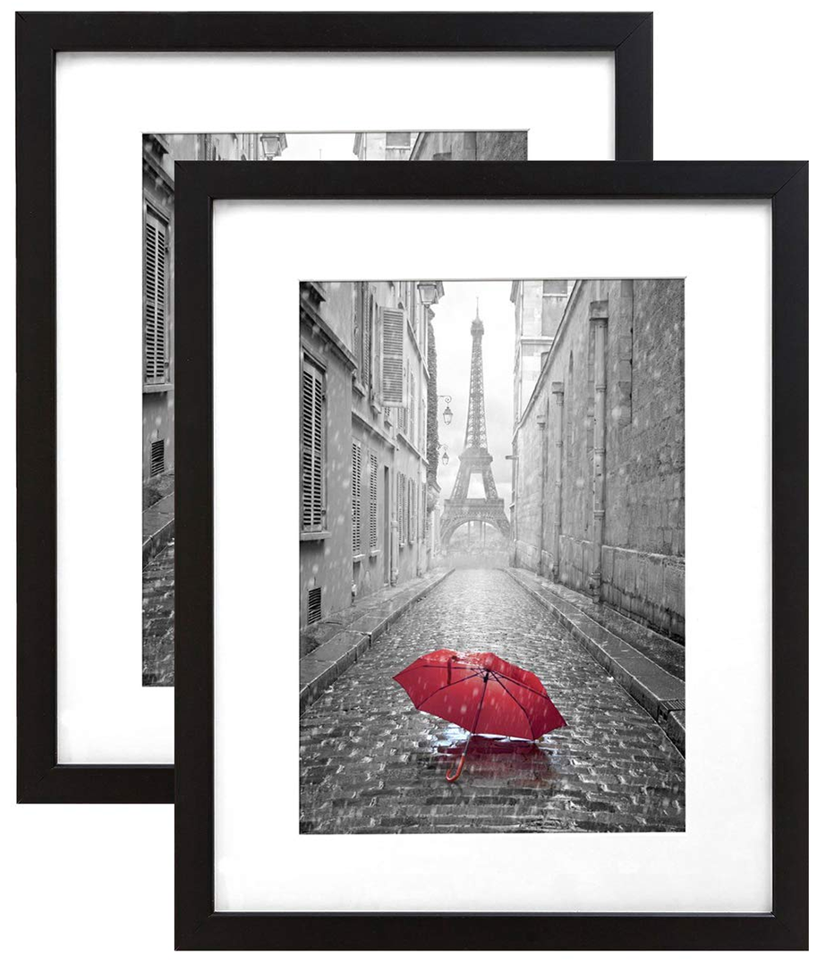 Two black 9x12 picture frames displaying 6x8 photos with white beveled mats, showcasing a modern and elegant design.