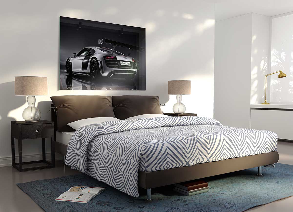 A modern glass print featuring the 2010 Audi R8 Lms, showcasing its sleek design and vibrant colors.