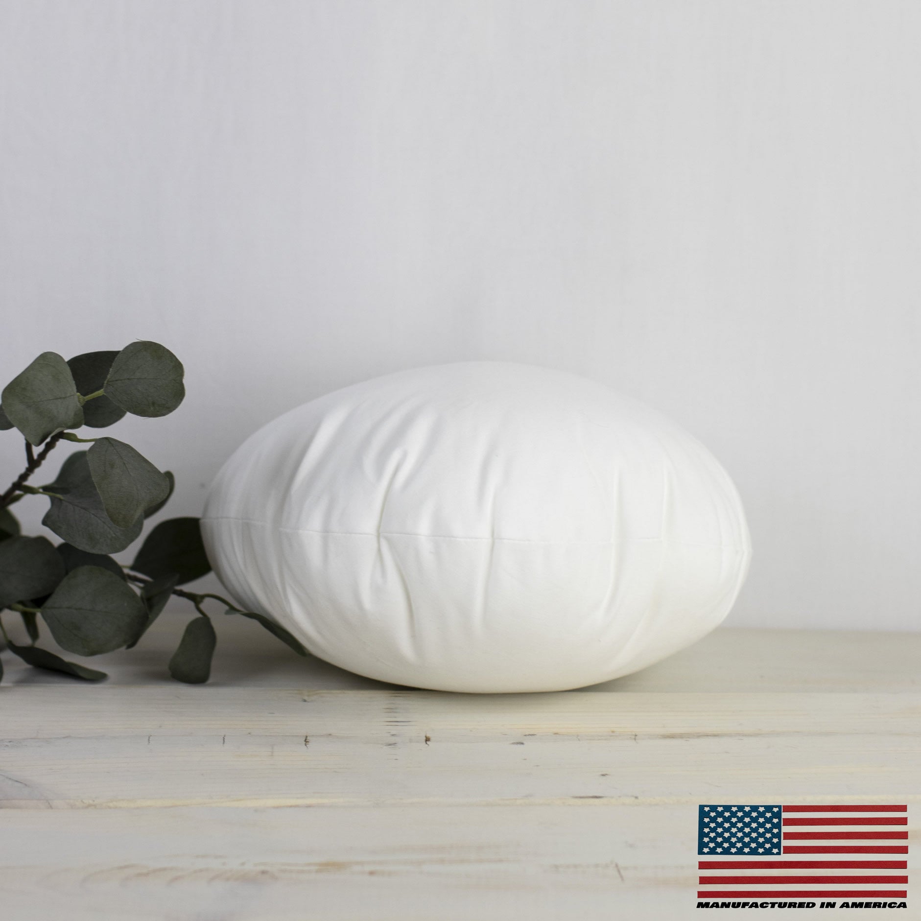 21-inch round angel hair down alternative pillow insert with soft hypoallergenic polyester fill, perfect for indoor and outdoor use.