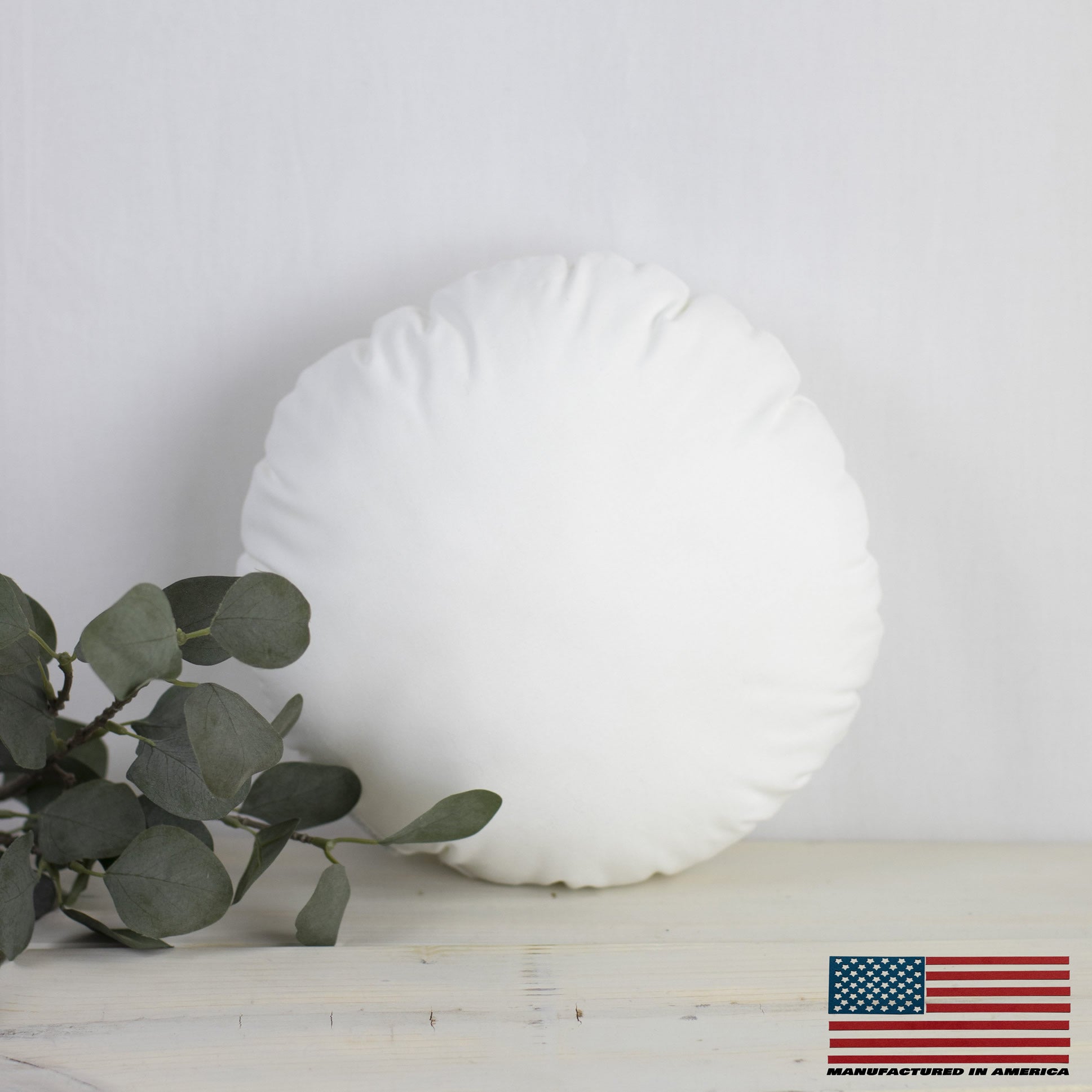 24-inch round angel hair down alternative pillow insert with a soft, plush design, suitable for indoor and outdoor use.