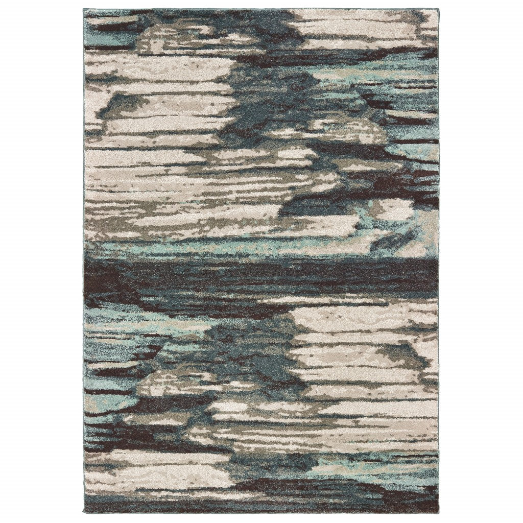 Ivory Blue Gray Abstract Layers Indoor Accent Rug, featuring a modern abstract design with soft high-pile texture.