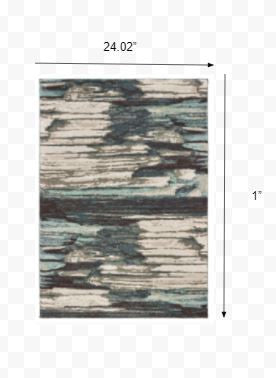 Ivory Blue Gray Abstract Layers Indoor Accent Rug, featuring a modern abstract design with soft high-pile texture.