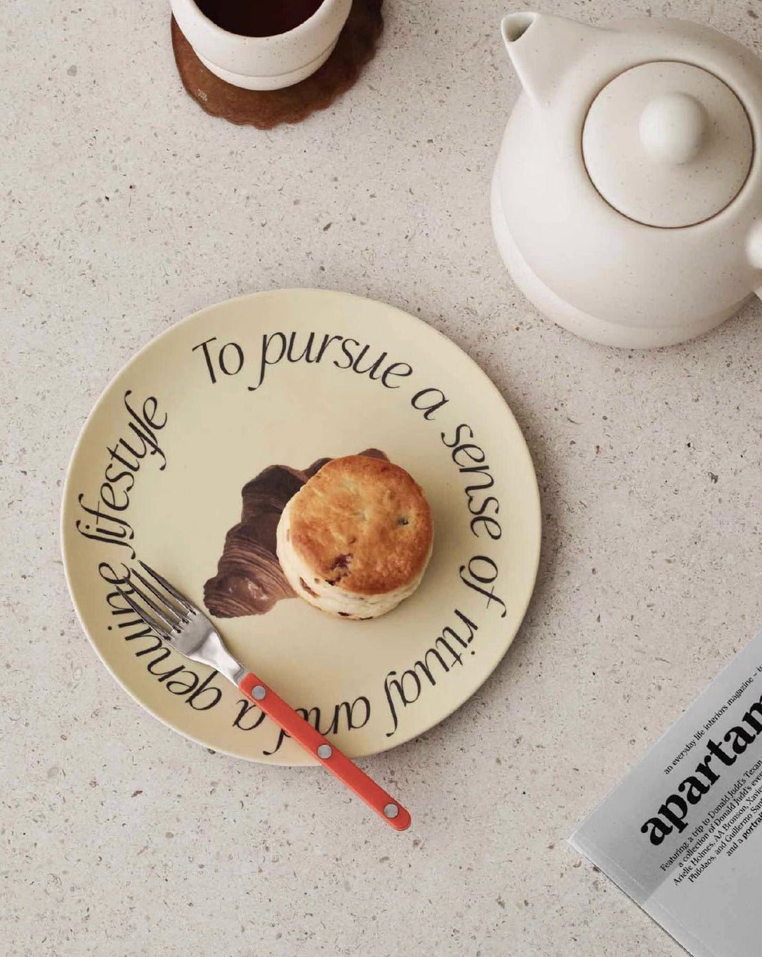 A set of four modern bamboo fiber plates featuring mushroom and croissant prints, showcasing eco-friendly design and vibrant colors.