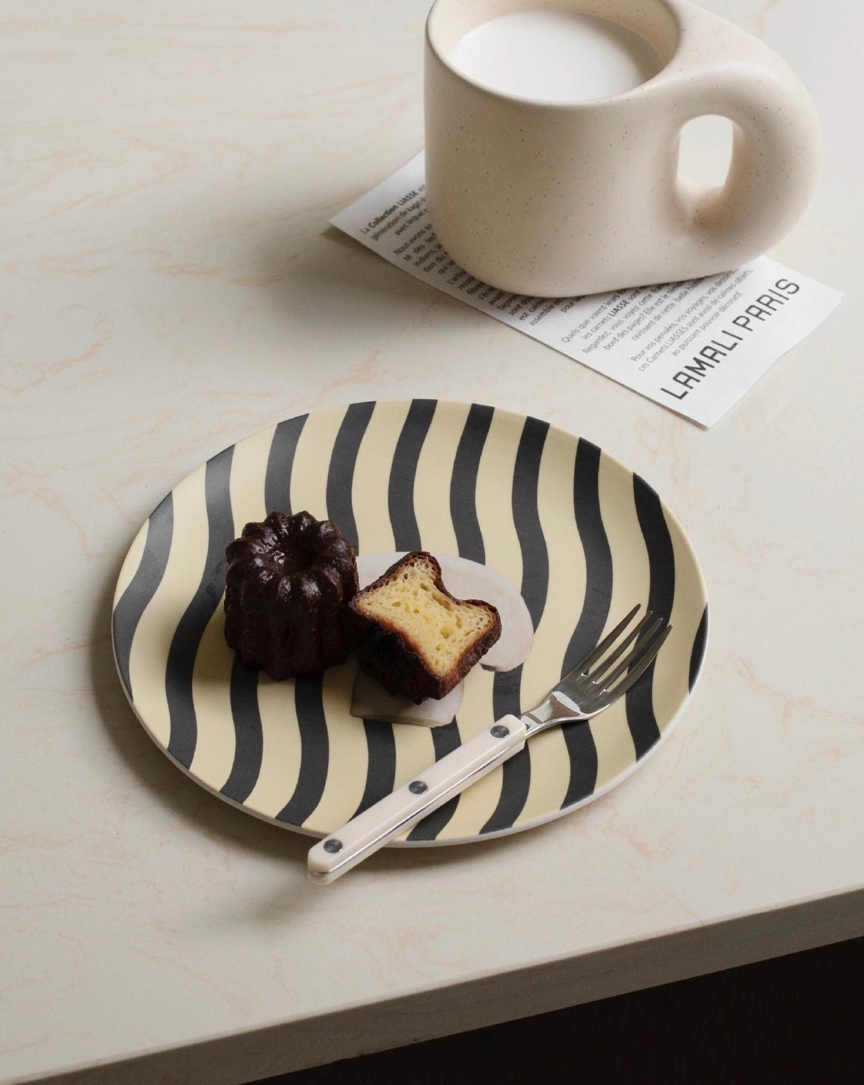 A set of four modern bamboo fiber plates featuring mushroom and croissant prints, showcasing eco-friendly design and vibrant colors.