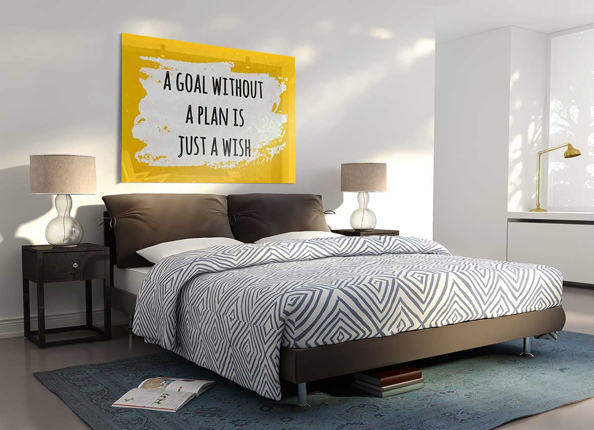 A modern glass print featuring the motivational quote 'A goal without a plan' in an elegant design, perfect for home or office decor.
