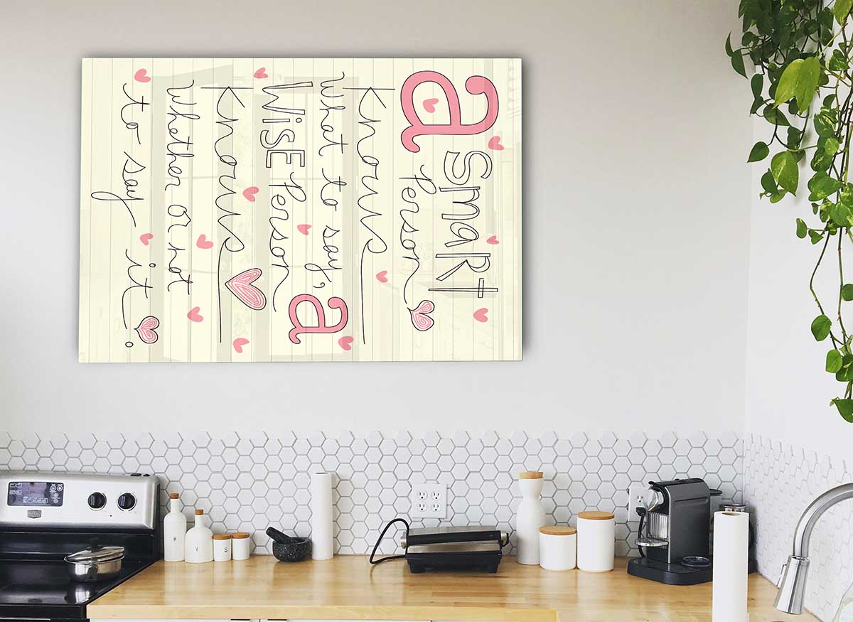 A modern glass print featuring the quote 'A Smart Person Knows What To Say', showcasing elegant design and vibrant colors.