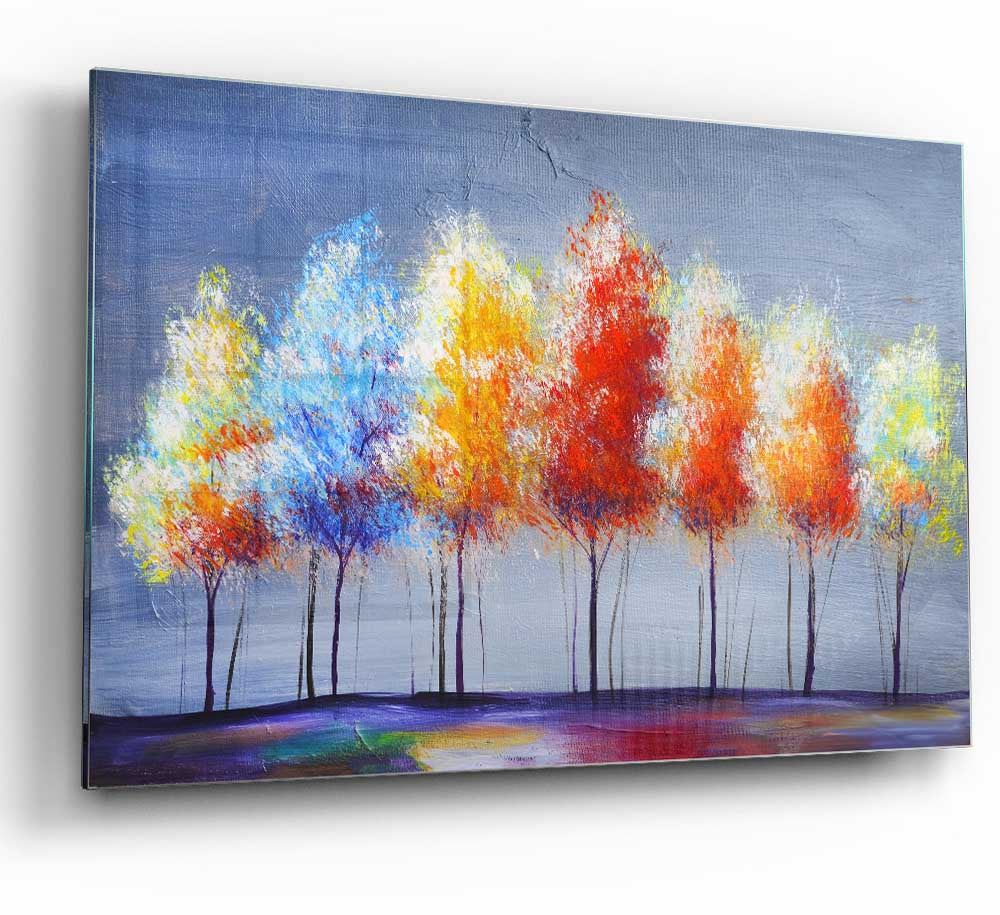 A vibrant glass print featuring a spectrum of colorful trees, perfect for modern home decor.