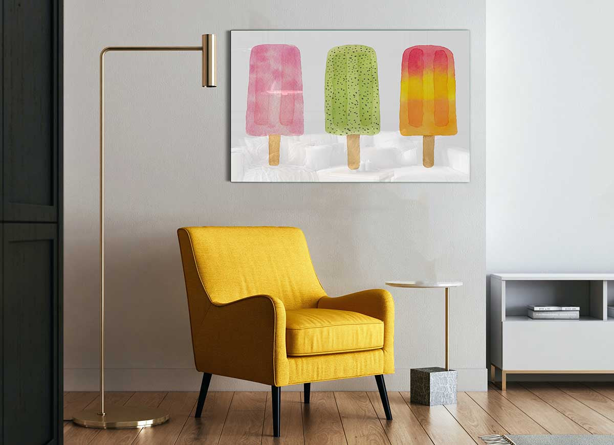 A modern glass print featuring a colorful trio of lollies, perfect for home decor.