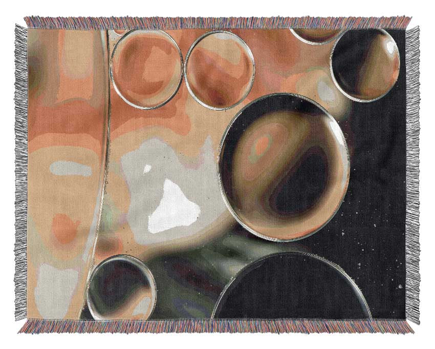 A luxurious Abstract Circles Droplets throw blanket made from 100% cotton, featuring an elegant abstract circle design in soft colors.