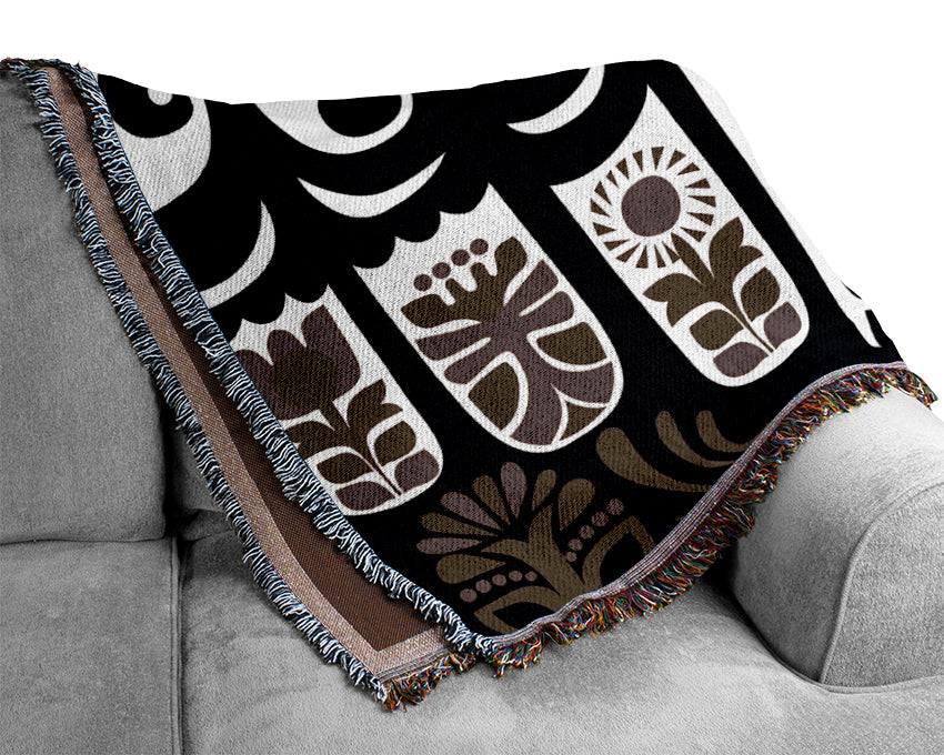A luxurious Abstract Hills Brown throw blanket made from 100% cotton, featuring a thermal weave and abstract design, perfect for home decor.