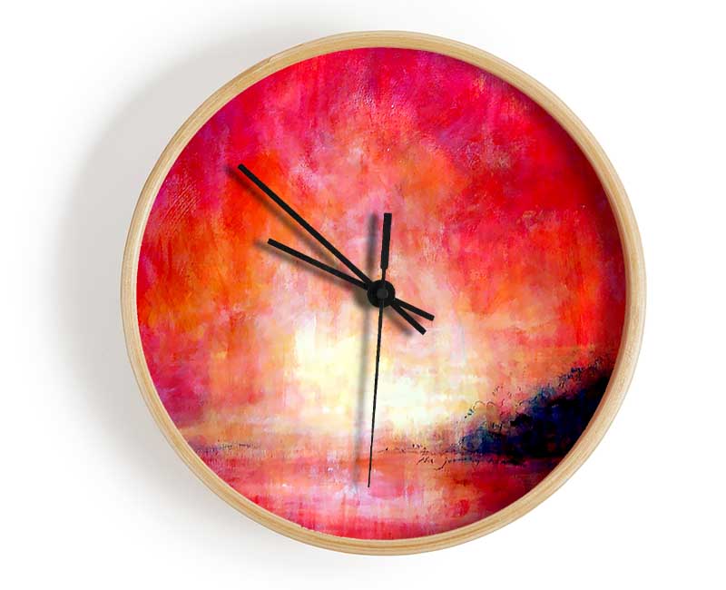 Abstract Pink River clock made from natural bamboo with a round face and clear Plexiglas lens, available in multiple colors.
