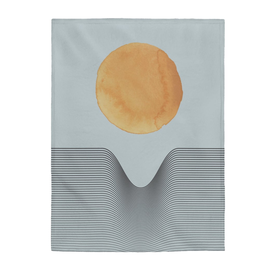 A cozy blue plush throw featuring abstract sun art design, available in three sizes, perfect for home decor.