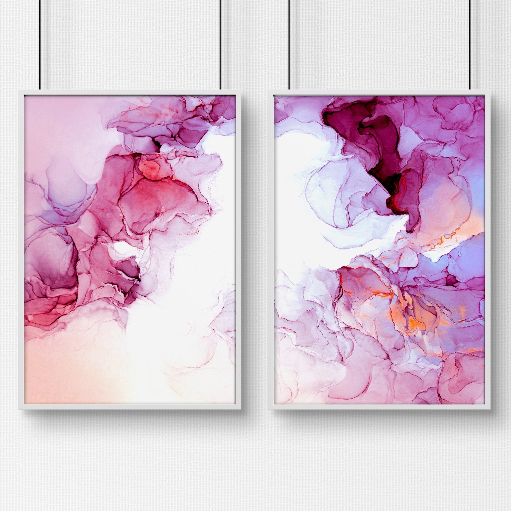 Set of 2 framed Magenta Abstract Wall Art prints featuring vibrant alcohol ink designs, perfect for living room decor.