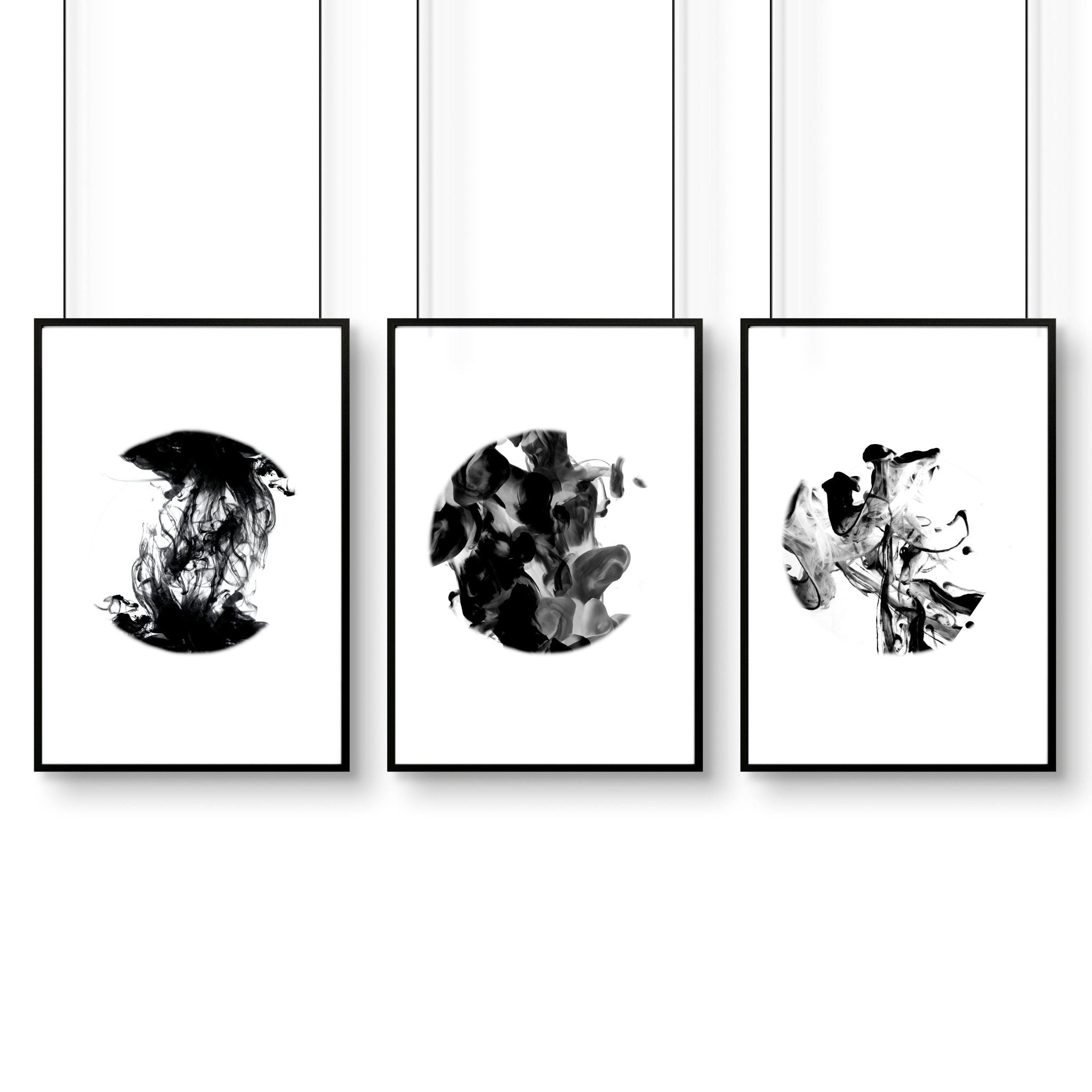 Set of 3 abstract framed wall art prints for office decor, featuring vibrant colors and modern designs in sleek black and white frames.