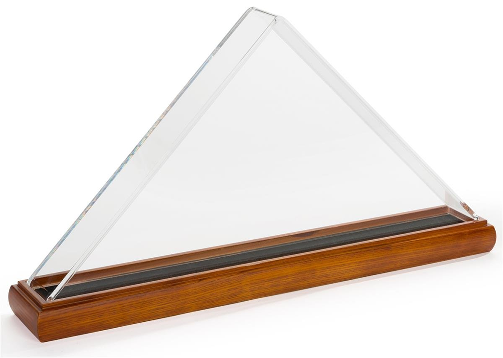 Acrylic flag display case with a solid cherry wood base, showcasing a folded 5' x 8' trifold flag.