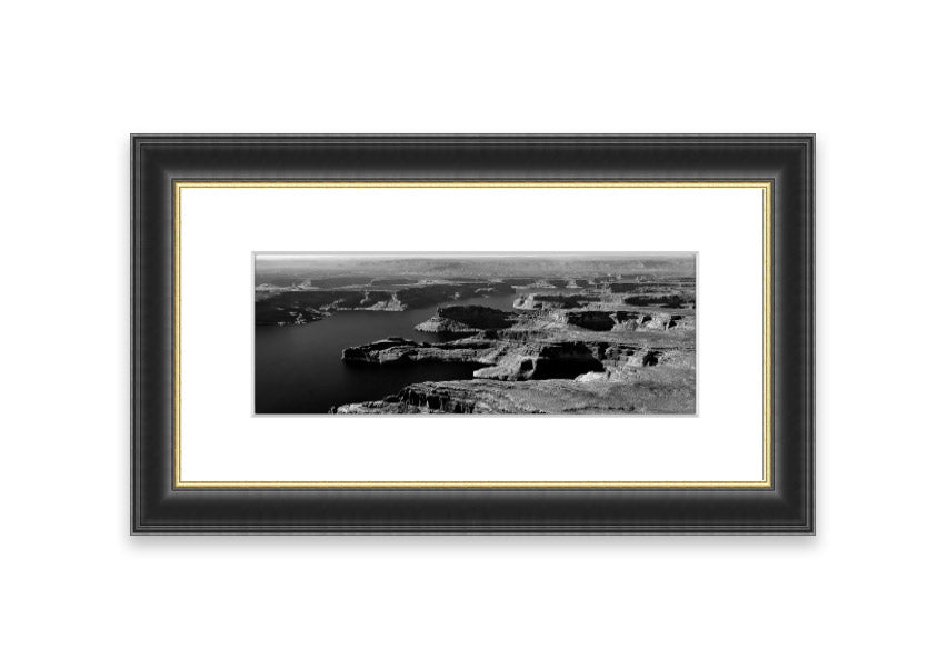 Framed print of an aerial view of a canyon in Cornwall, showcasing vibrant colors and intricate details.