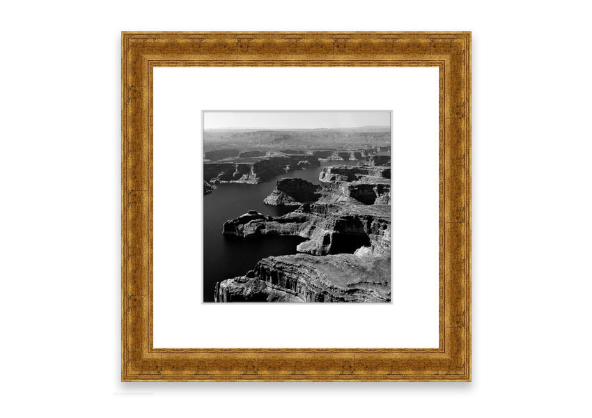 Framed print of an aerial view of a canyon in Cornwall, showcasing vibrant colors and intricate details.