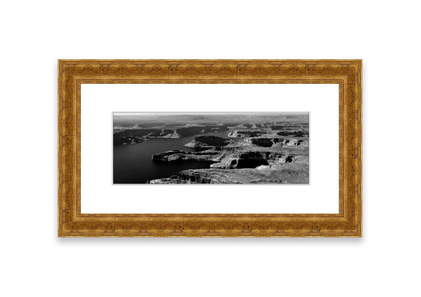 Framed print of an aerial view of a canyon in Cornwall, showcasing vibrant colors and intricate details.