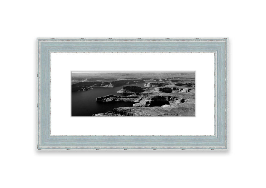 Framed print of an aerial view of a canyon in Cornwall, showcasing vibrant colors and intricate details.