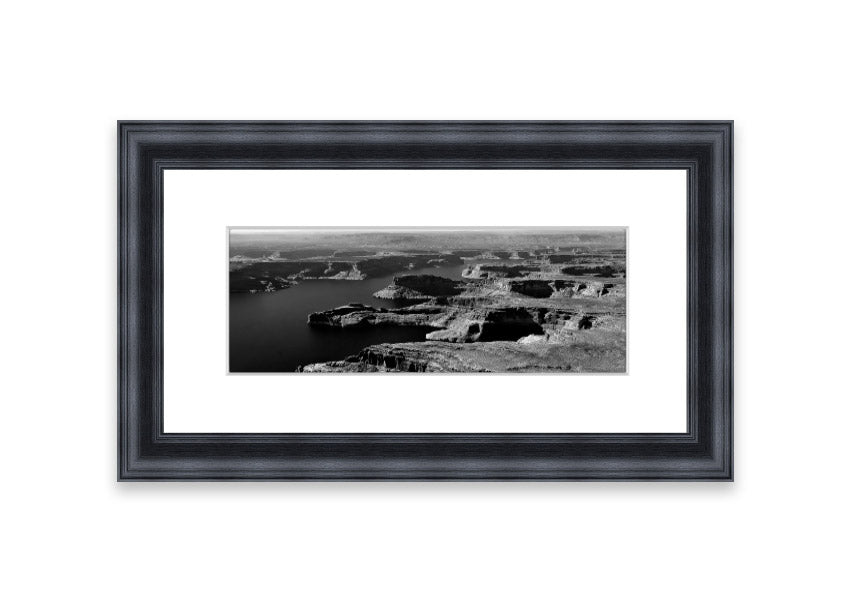 Framed print of an aerial view of a canyon in Cornwall, showcasing vibrant colors and intricate details.