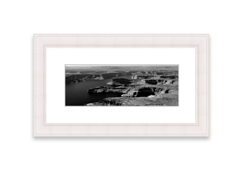 Framed print of an aerial view of a canyon in Cornwall, showcasing vibrant colors and intricate details.