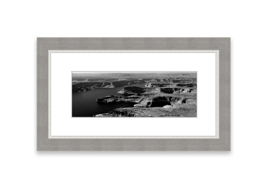 Framed print of an aerial view of a canyon in Cornwall, showcasing vibrant colors and intricate details.