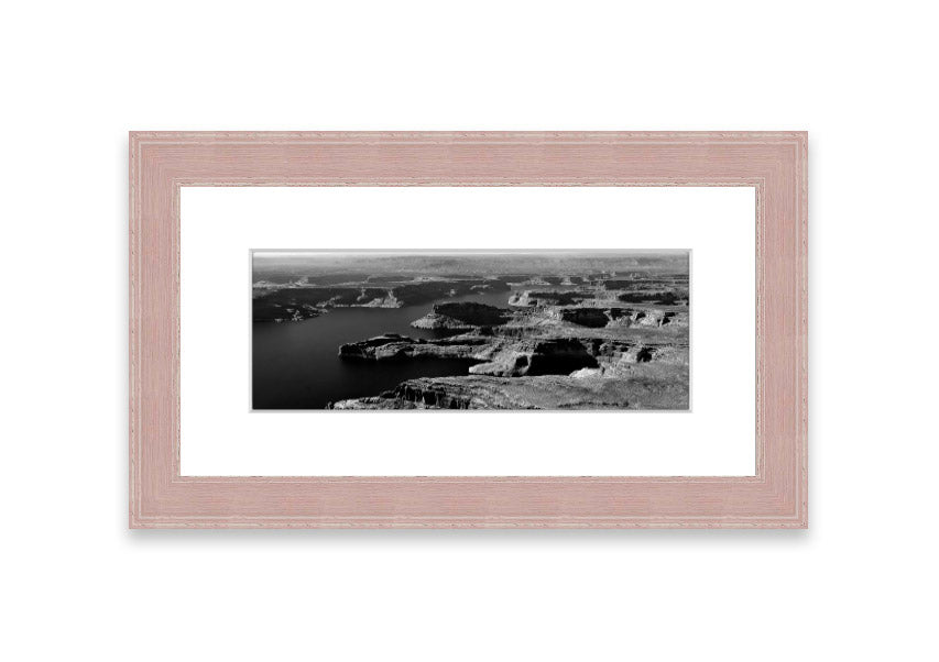 Framed print of an aerial view of a canyon in Cornwall, showcasing vibrant colors and intricate details.