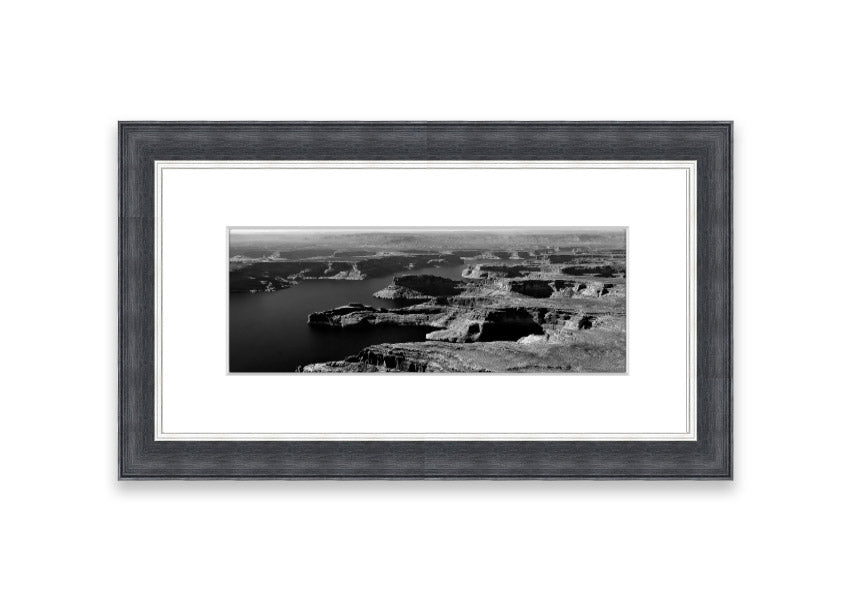 Framed print of an aerial view of a canyon in Cornwall, showcasing vibrant colors and intricate details.