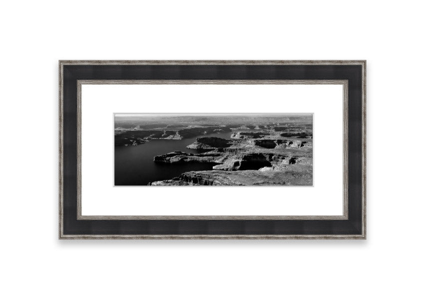 Framed print of an aerial view of a canyon in Cornwall, showcasing vibrant colors and intricate details.