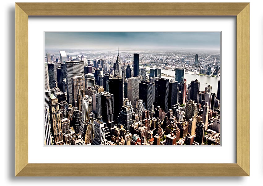 Framed print of an aerial view of New York City showcasing the skyline and urban landscape.