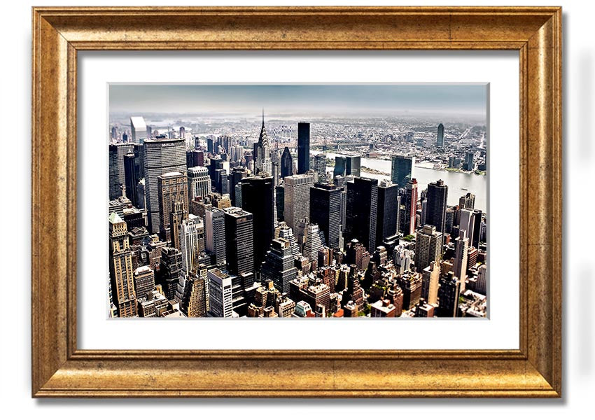 Framed print of an aerial view of New York City showcasing the skyline and urban landscape.