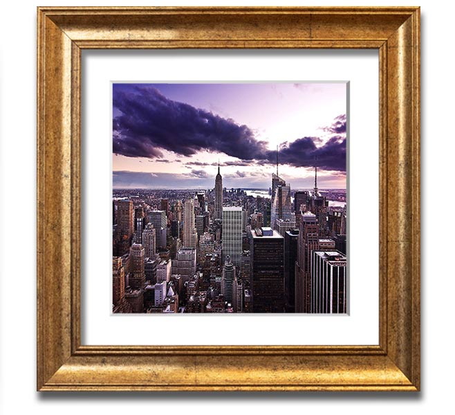 Aerial view of New York City skyline at dusk, framed in a stylish square frame, showcasing vibrant city lights.