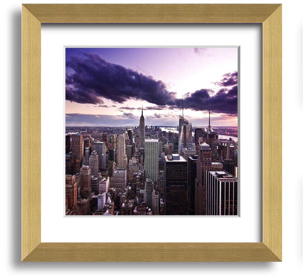 Aerial view of New York City skyline at dusk, framed in a stylish square frame, showcasing vibrant city lights.