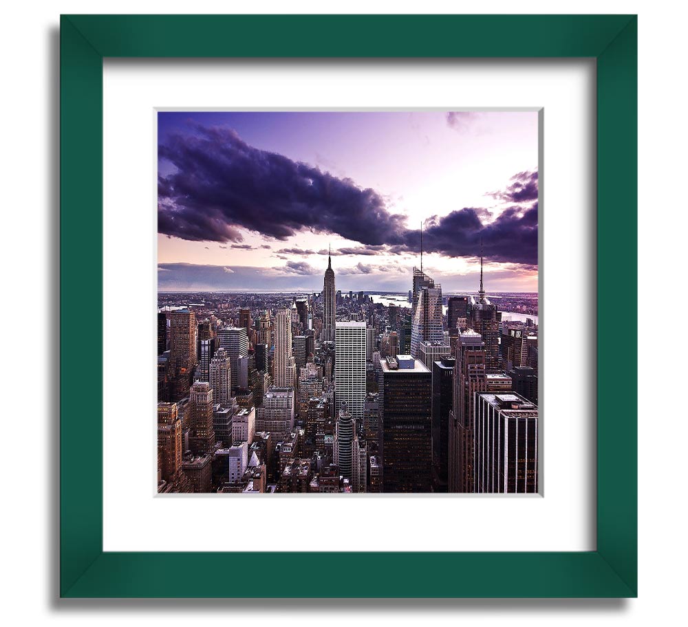 Aerial view of New York City skyline at dusk, framed in a stylish square frame, showcasing vibrant city lights.