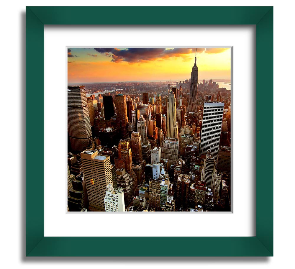 Aerial view of New York City at sunset, framed in a square frame, showcasing vibrant colors and iconic skyline.