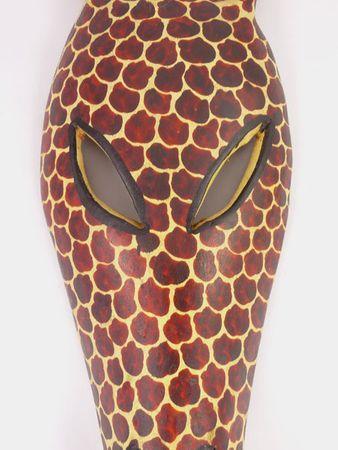 Handcrafted African Giraffe Head Wooden Mask showcasing intricate patterns and natural wood finish, perfect for home decor.