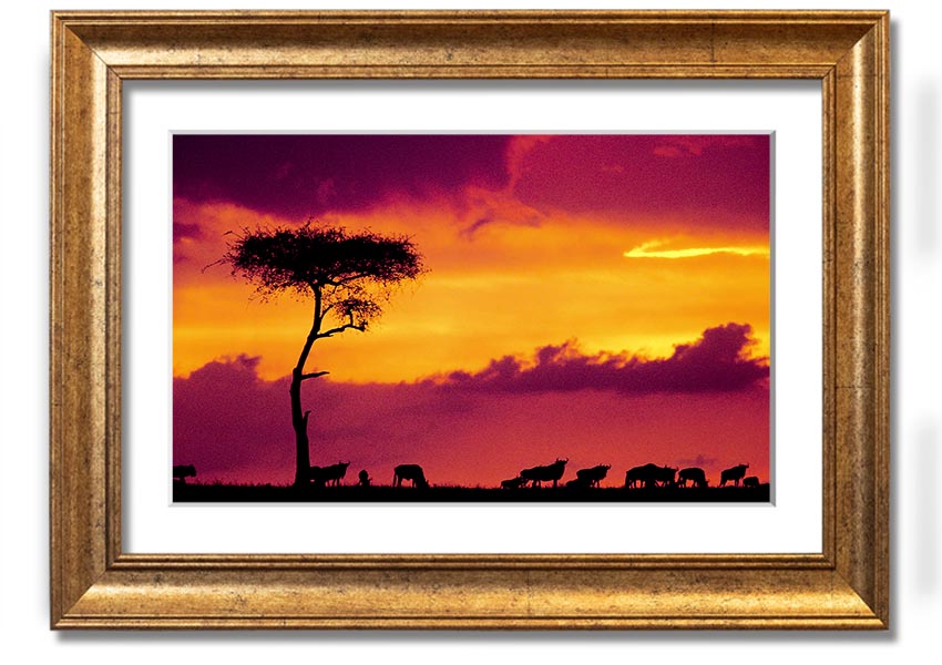 A beautifully framed print of an African sunset, showcasing vibrant colors and serene landscapes, ready to hang on the wall.
