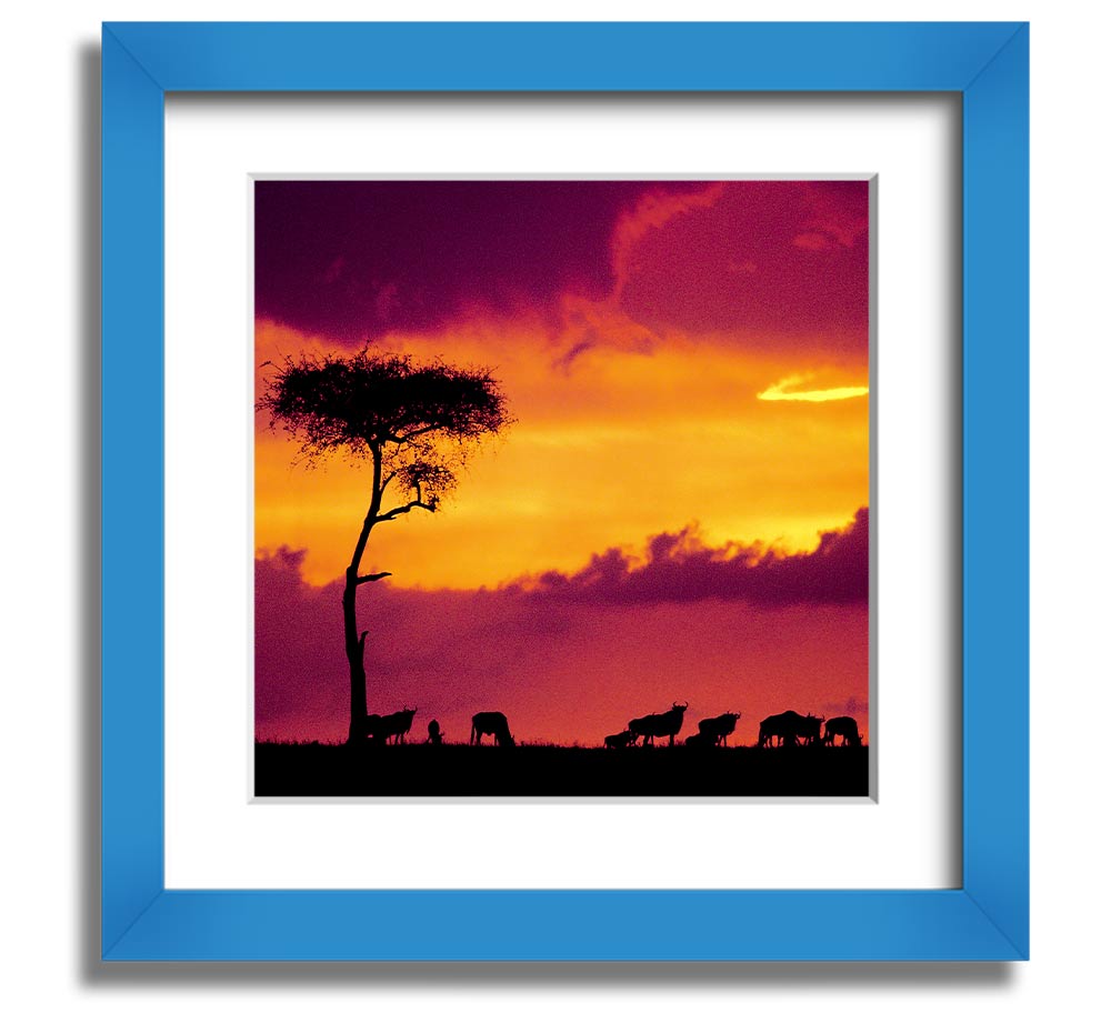 A beautifully framed print of an African sunset, showcasing vibrant colors and serene landscapes, ready to hang.